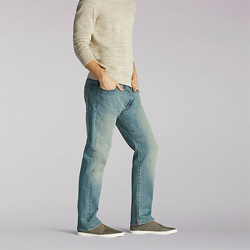 EXTREME MOTION ATHLETIC TAPERED LEG JEANS