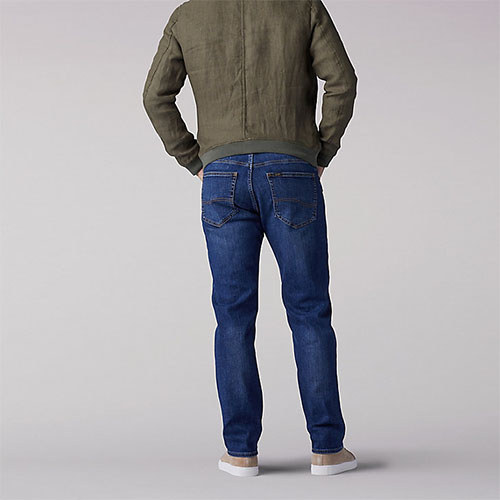 EXTREME MOTION STRAIGHT FIT TAPERED LEG JEANS